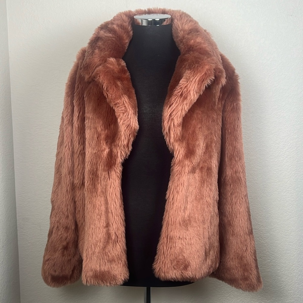 This gorgeous coat is by A New Day and is blush in color.